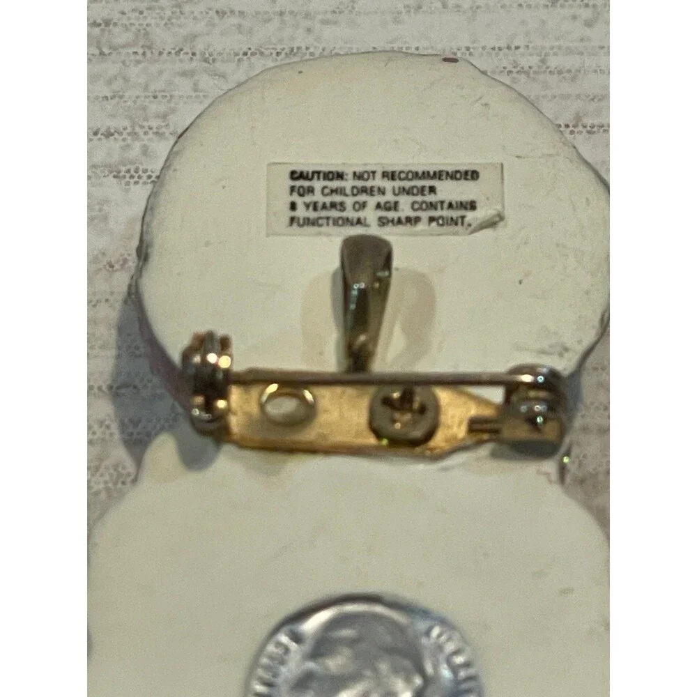 1999 Snowsnickel brooch, pen, and earrings set from a nickel to the snowsnickel
